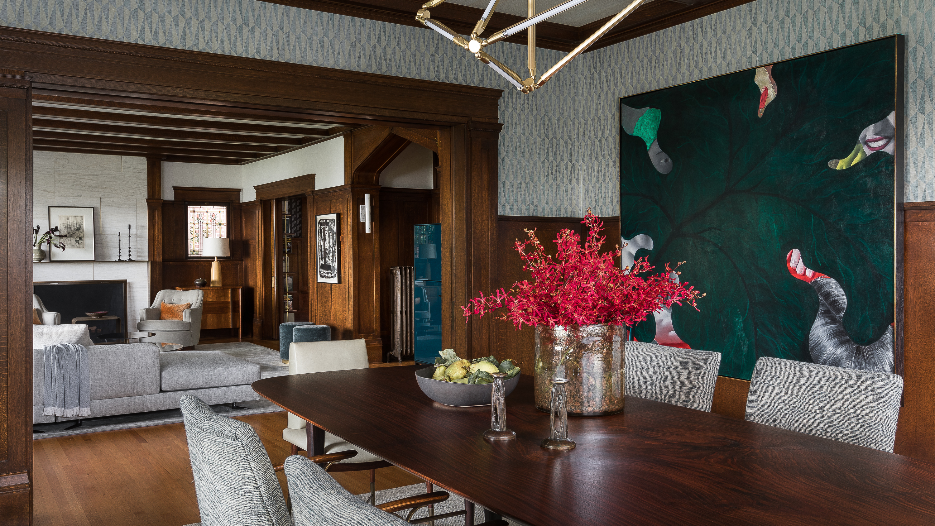 A wall-sized oil painting by Jordan Kasey adds depth and impact to Dining Room.