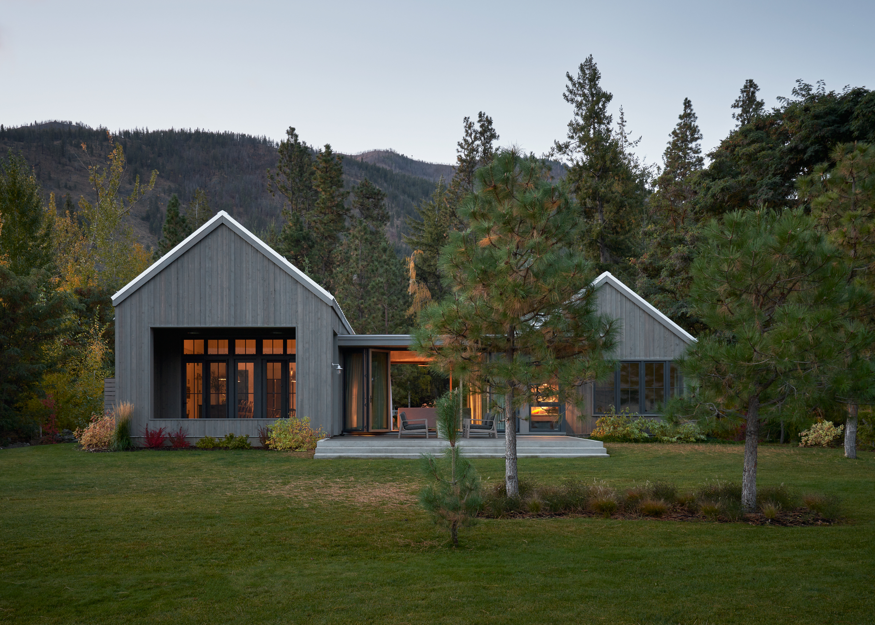 Looking through the modern rustic lake Chelan house. Pacific Northwest Architecture.