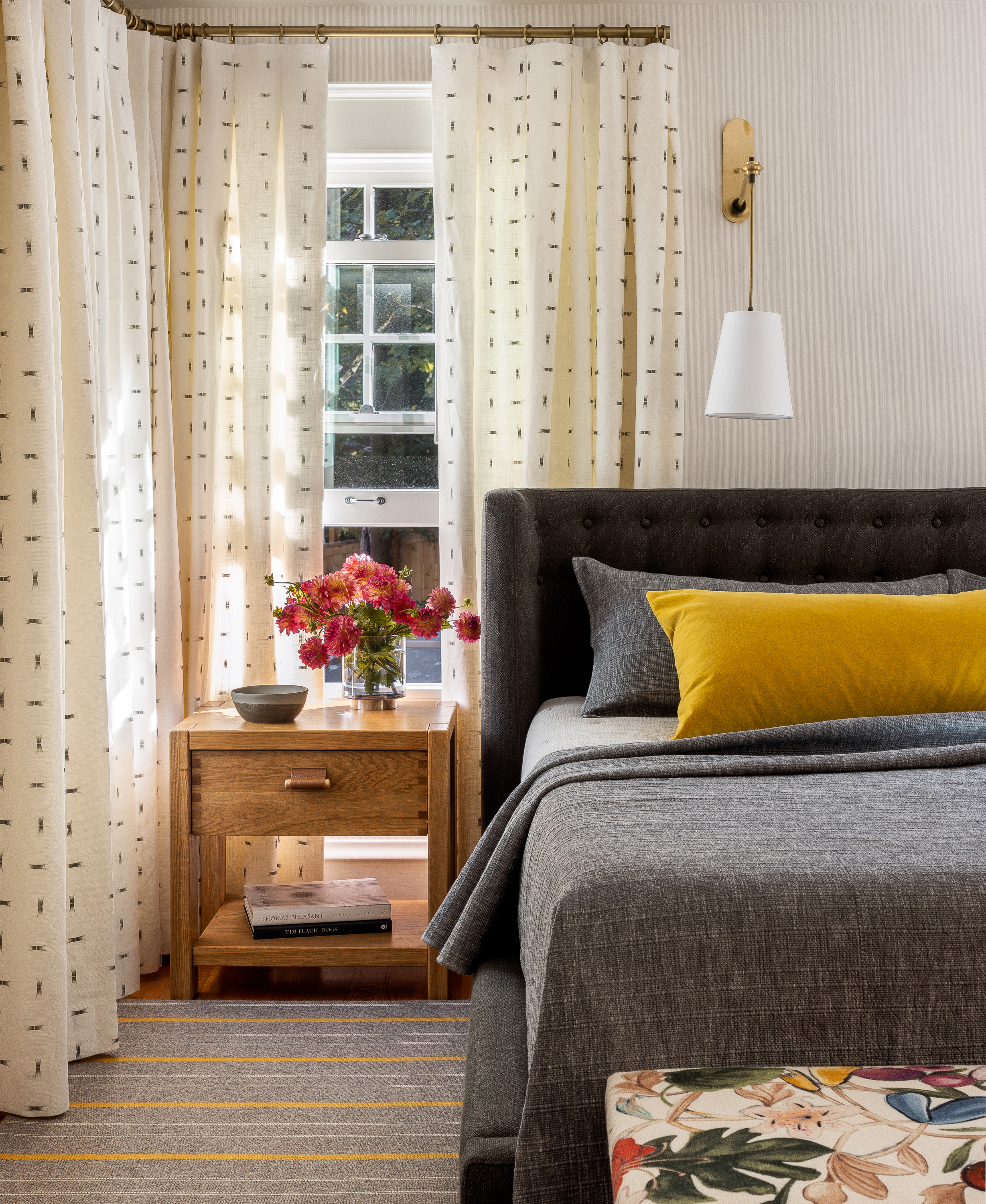 A cheerful and sophisticated guest bedroom.