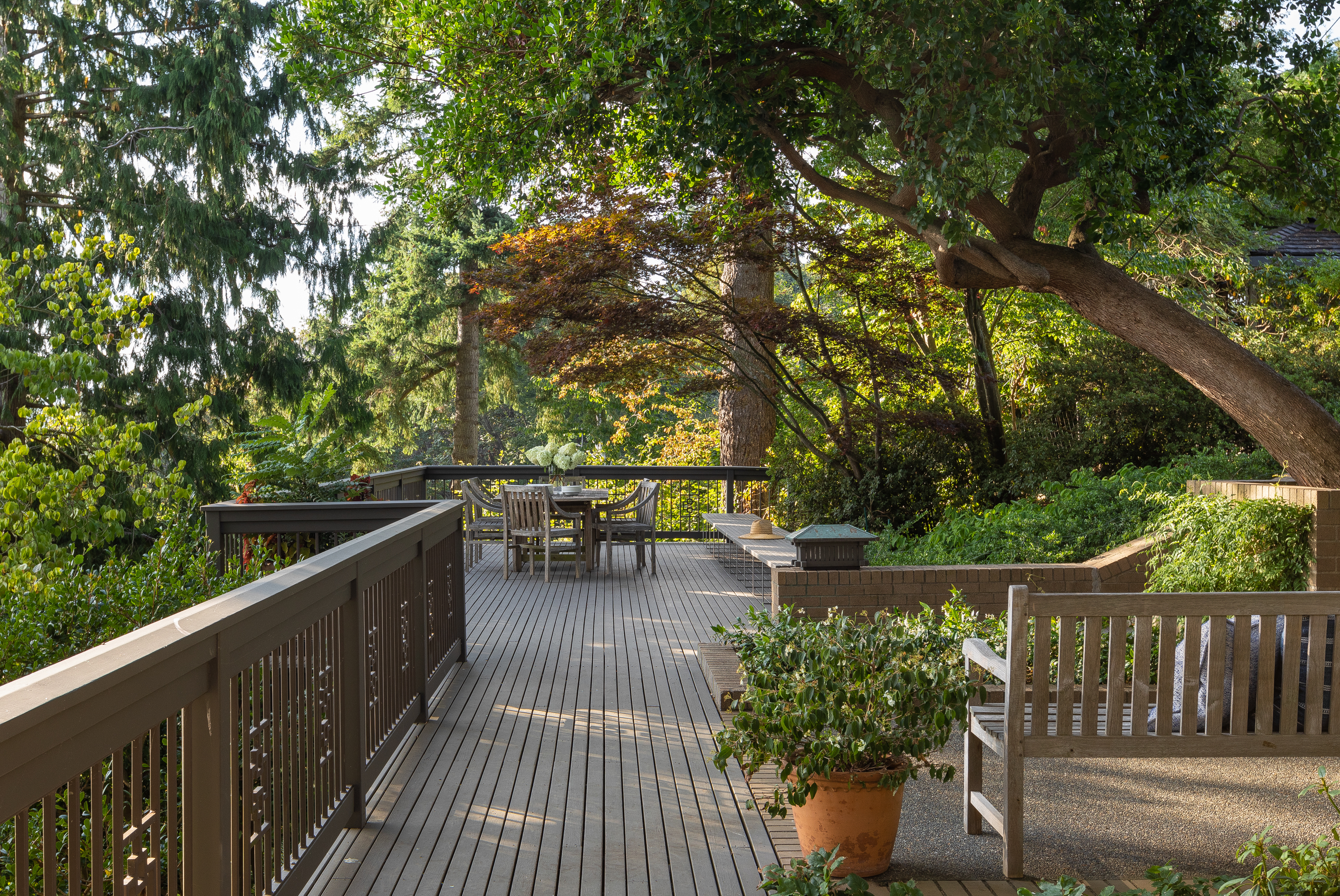 The large raised deck offers impressive views and features nods to Asian design and architecture.